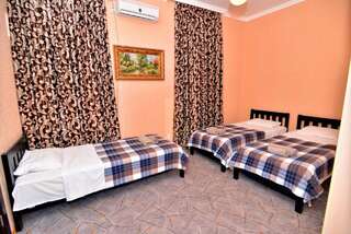 Гостевой дом Hotel Orange Kutaisi Кутаиси Трехместный номер с собственной ванной комнатой-11